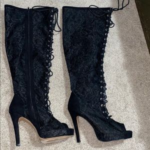 Thigh high lace up boots